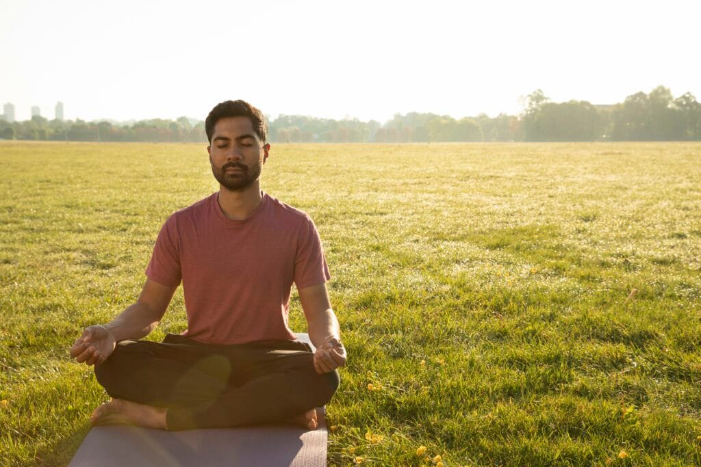a man meditate in the garden