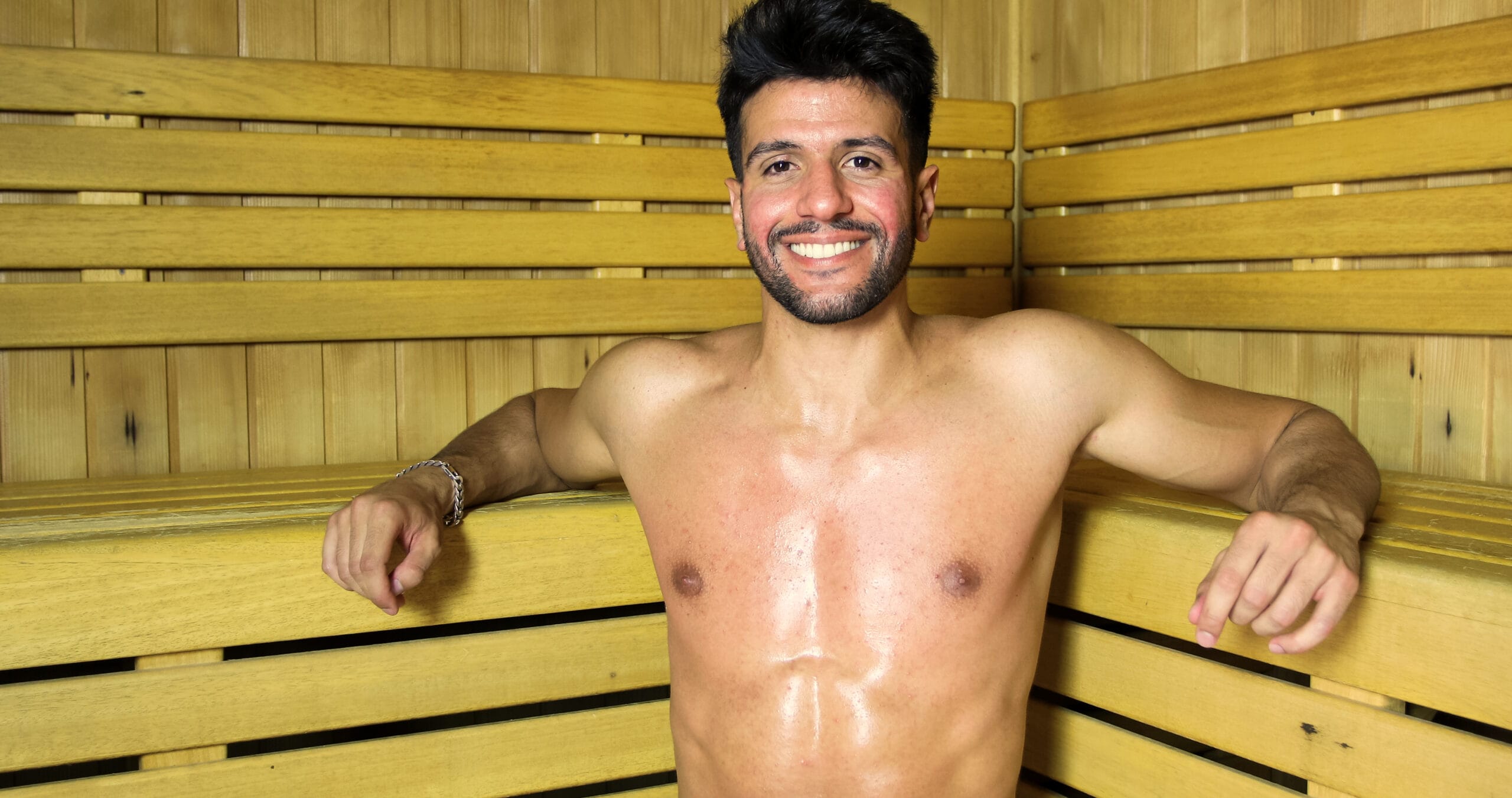 Man relaxing in a sauna for stress relief